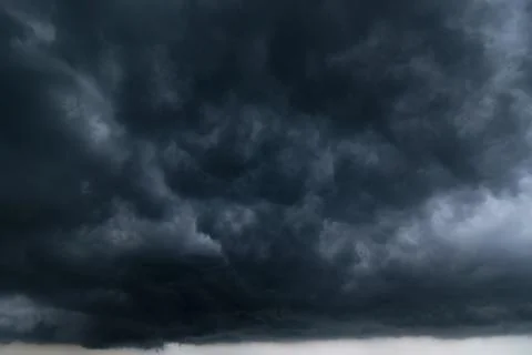 Dark storm clouds with background,Dark clouds before a thunder-storm. Stock Photos