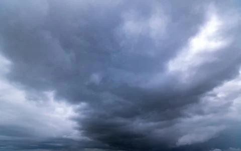 Dark storm clouds with background,Dark clouds before a thunder-storm. 写真素材