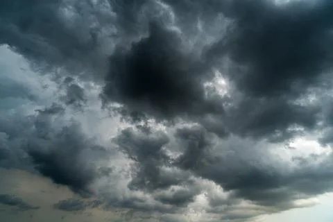 Dark storm clouds with background,Dark clouds before a thunder-storm. Stock Photos