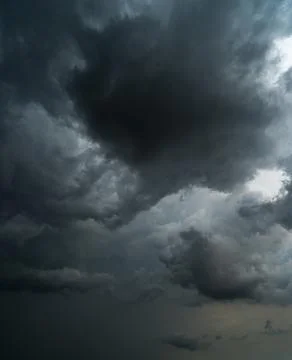 Dark storm clouds with background,Dark clouds before a thunder-storm. Stock Photos