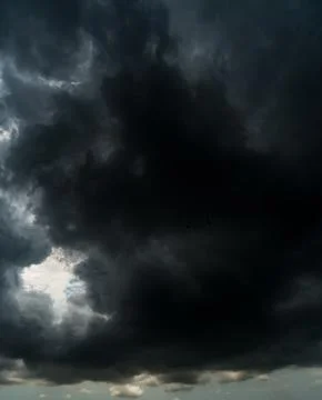 Dark storm clouds with background,Dark clouds before a thunder-storm. Stock Photos