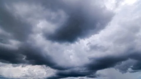 Dark storm clouds with background,Dark clouds before a thunder-storm. Stock Photos