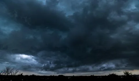 Dark storm clouds with background,Dark clouds before a thunder-storm. Stock Photos