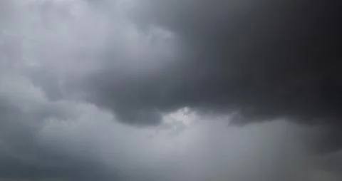 Dark storm clouds with background,Dark clouds before a thunder-storm. Stock Photos