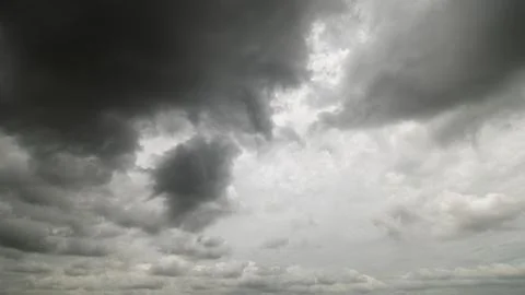 Dark storm clouds with background,Dark clouds before a thunder-storm. Stock Photos
