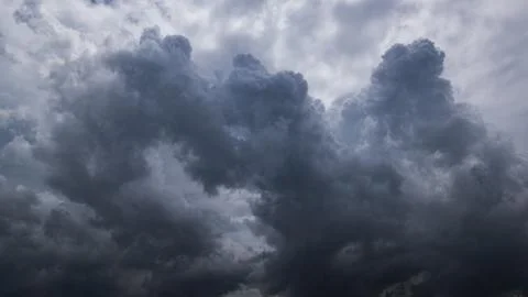 Dark storm clouds with background,Dark clouds before a thunder-storm. Stockfoto's