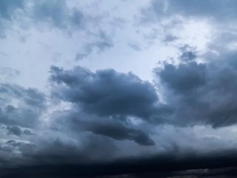 Dark storm clouds with background,Dark clouds before a thunder-storm. Stock Photos