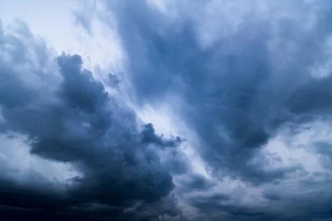 Dark storm clouds with background,Dark clouds before a thunder-storm. Stock Photos
