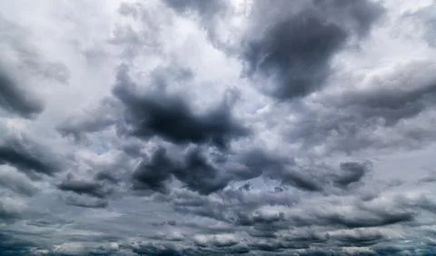 Dark storm clouds with background,Dark clouds before a thunder-storm. Stock Photos