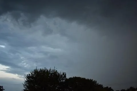Dark Storm Clouds Building over Midwest Town Fotos de archivo