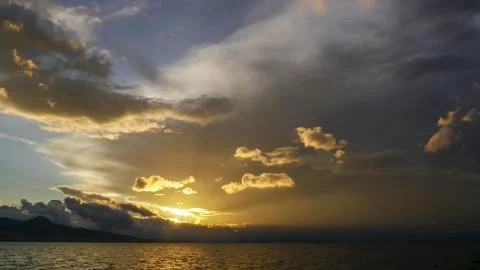 Dark storm clouds. Dark clouds before a sunset and thunder storm. Stock Photos