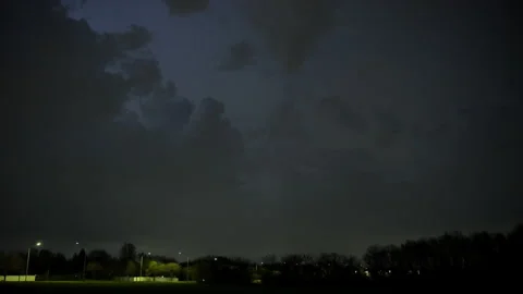 Dark storm clouds with endless lightning in night sky. Dramatic thunderstorm, 스톡 동영상 334027466