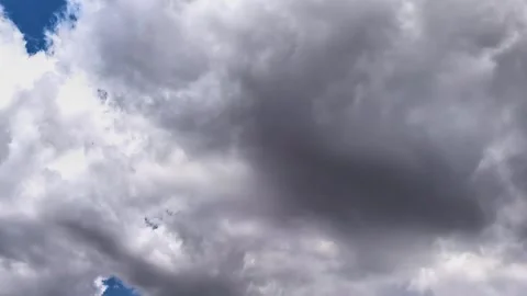 Dark storm clouds gather before heavy rain in time lapse, dramatic weather Stock Footage 340332555