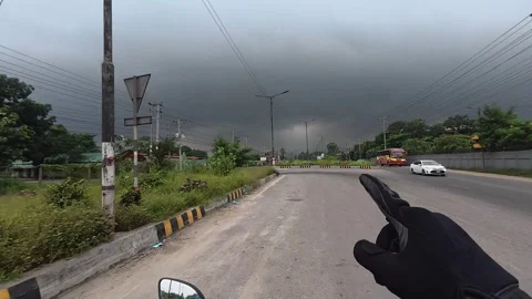 Dark storm clouds gathered over empty asphalt road in rural area Stock Footage 342158979