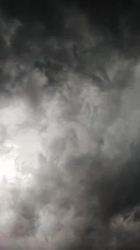 Dark storm clouds gathering in the sky Stock Photos