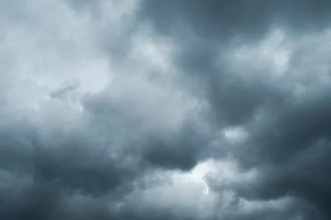 Dark storm clouds gathering in the sky Stock Photos