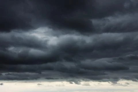Dark storm clouds hanging low Stock Photos