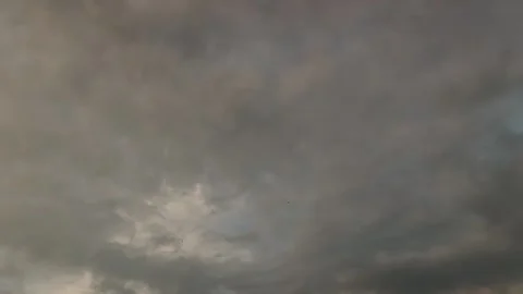 Dark storm clouds with low light and heavy texture. Thick overcast moves across Stock Footage 323437324