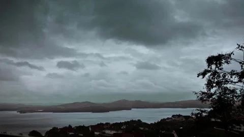 Dark Storm Clouds Moving Fast Over Norway – Timelapse Stock Footage 307895677