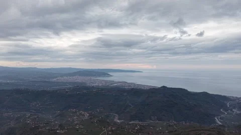Dark Storm Clouds Moving Over Coastal City and Sea Timelapse in 4K Stock Footage 339006194
