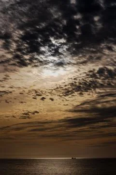 Dark storm clouds over calm Atlantic horizon Stock Photos