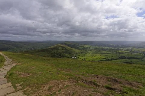 Dark storm clouds over Mam Tor, Castleton in the High Peak of Derbyshire. Photos