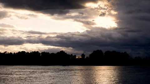 Dark storm clouds over river Stock Footage 111168770