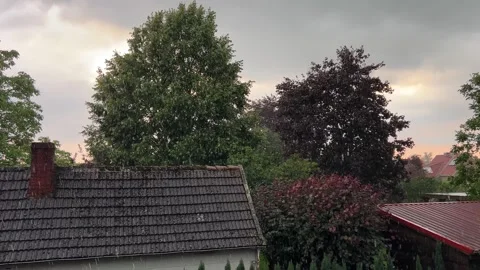 Dark Storm Clouds Over Rooftops and Trees During Summer Weather Stock Footage 340213963