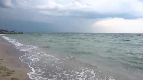 Dark storm clouds over the sea beach. Beaches without people Stock Footage 157219152