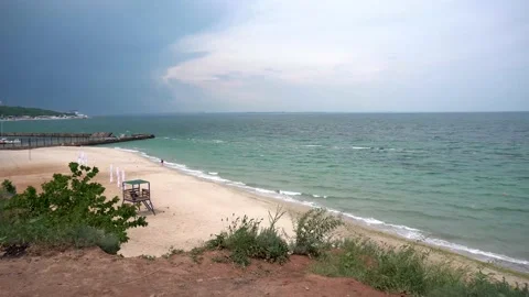 Dark storm clouds over the sea beach. Beaches without people Stock Footage 157219164