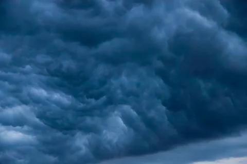 Dark storm clouds Stock Photos