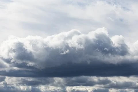 Dark storm clouds before the rain. Bad weather. Stock Photos