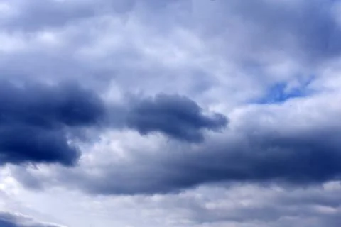 Dark storm clouds before rain . Stock Photos