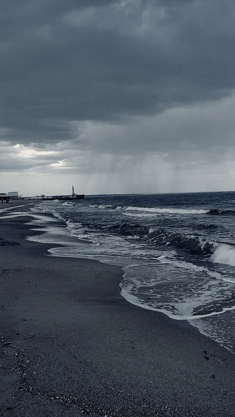 Dark storm clouds rain sea surface at sunset Nature Natural background Vertical Stock Footage 285371152