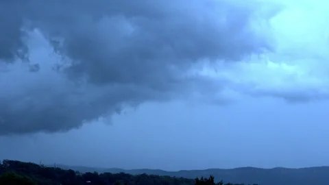 Dark Storm Clouds Rolling In – Loopable Time Lapse Stock Footage 325637429