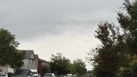 Dark Storm Clouds Rolling Over Suburban Neighborhood Sky Stock Footage 316919429