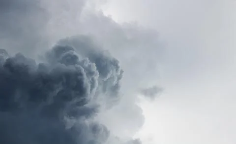 Dark storm clouds in the sky before the rain. Stock Photos