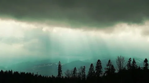 Dark Storm Clouds with the Sun's Rays over the Carpathian Mountains Stock Footage 48458514