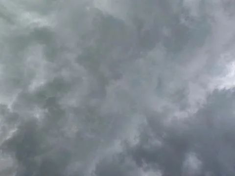 Dark storm clouds texture. Dramatic overcast sky background before rain. Stock Photos