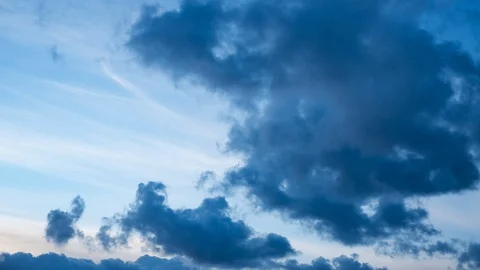 Dark storm clouds time lapse moving slowly towards camera Stock Footage 105926388