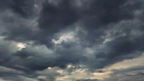 Dark storm clouds timelapse with sunlight breaking through – dramatic weather 스톡 동영상 311907162