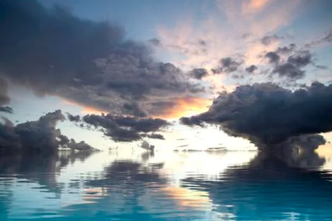 Dark storm with water reflection. a sky of clouds reflected in a calm sea. Stock Illustration