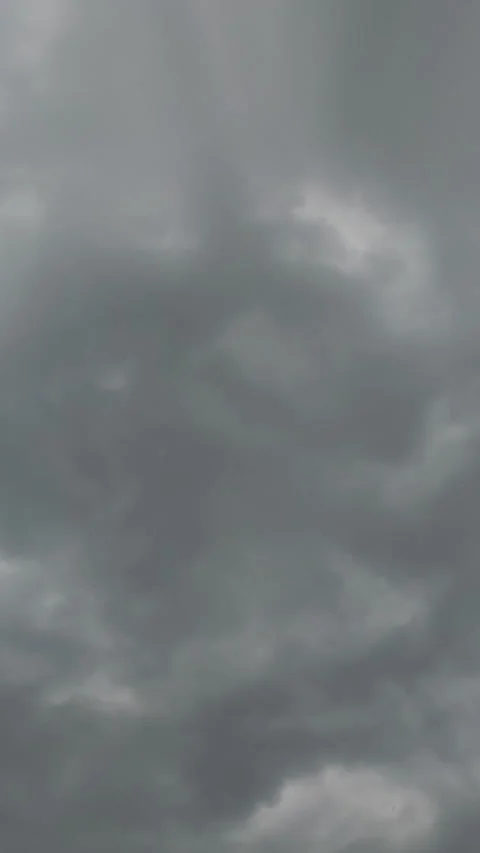 Dark stormy clouds gathering in the sky. Raindrops falling on the camera. View Vídeo Stock 328628296