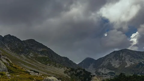 Dark Stormy Clouds Rolling Over Alps Mountain Timelapse Stock Footage 310668599