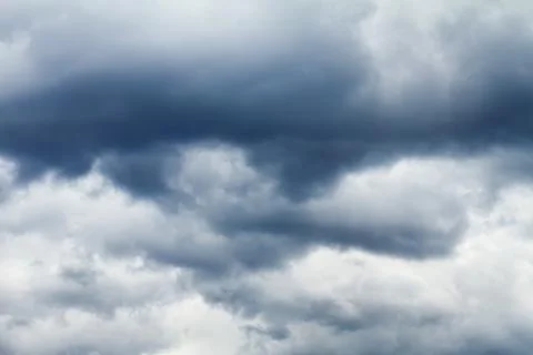 Dark stormy clouds in sky Stock Photos