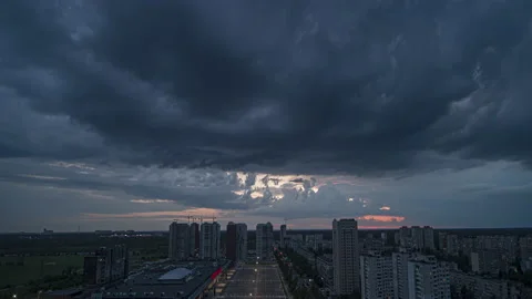 The dark stormy cloudscape over the city. time lapse Video stock 133202916