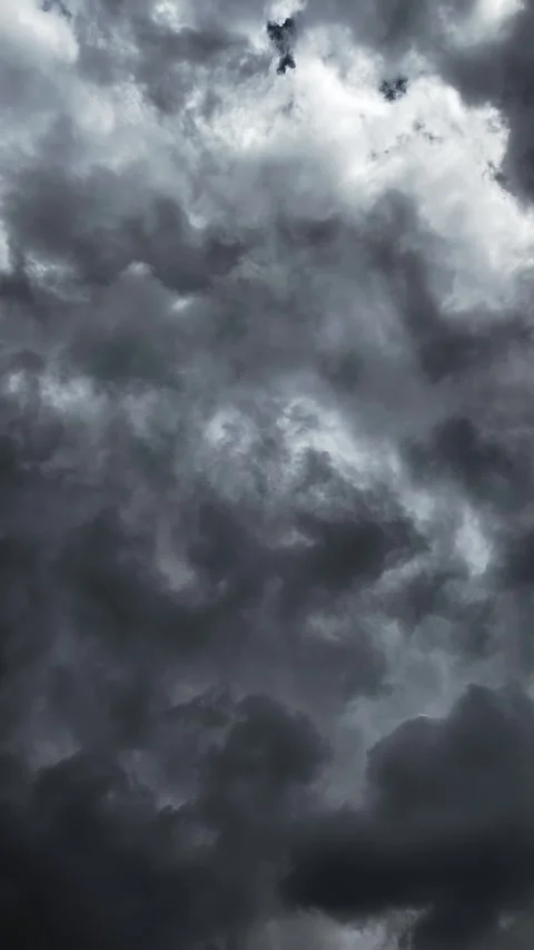 Dark stormy rain cloud formations move quickly overhead TIMELAPSE Video stock 315652994