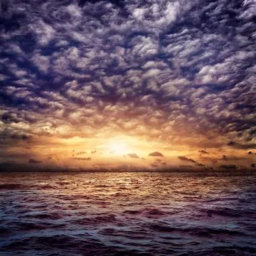 Dark stormy sea with a dramatic cloudy sky Stock Photos