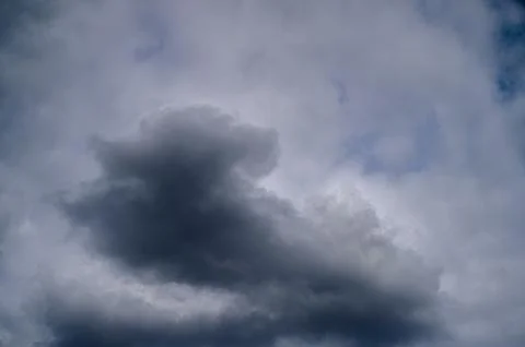Dark stormy sky with dramatic lighting Stock Photos
