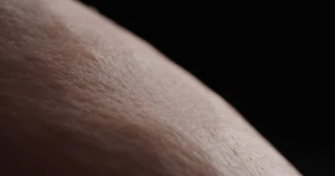 Dark substance spreading slowy on human body Stock Footage 104260458